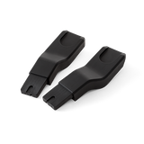A pair of black Maxi-Cosi capsule adapters for strollers.