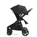 Olive pram in parent facing mode in Black Luxe colour