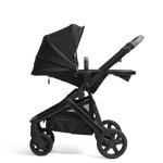 Olive pram in a parental facing side on a side view