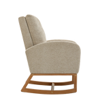 A modern rocking chair with a high back, textured beige fabric, and a natural wood rocking base, shown from a side profile on a white background.