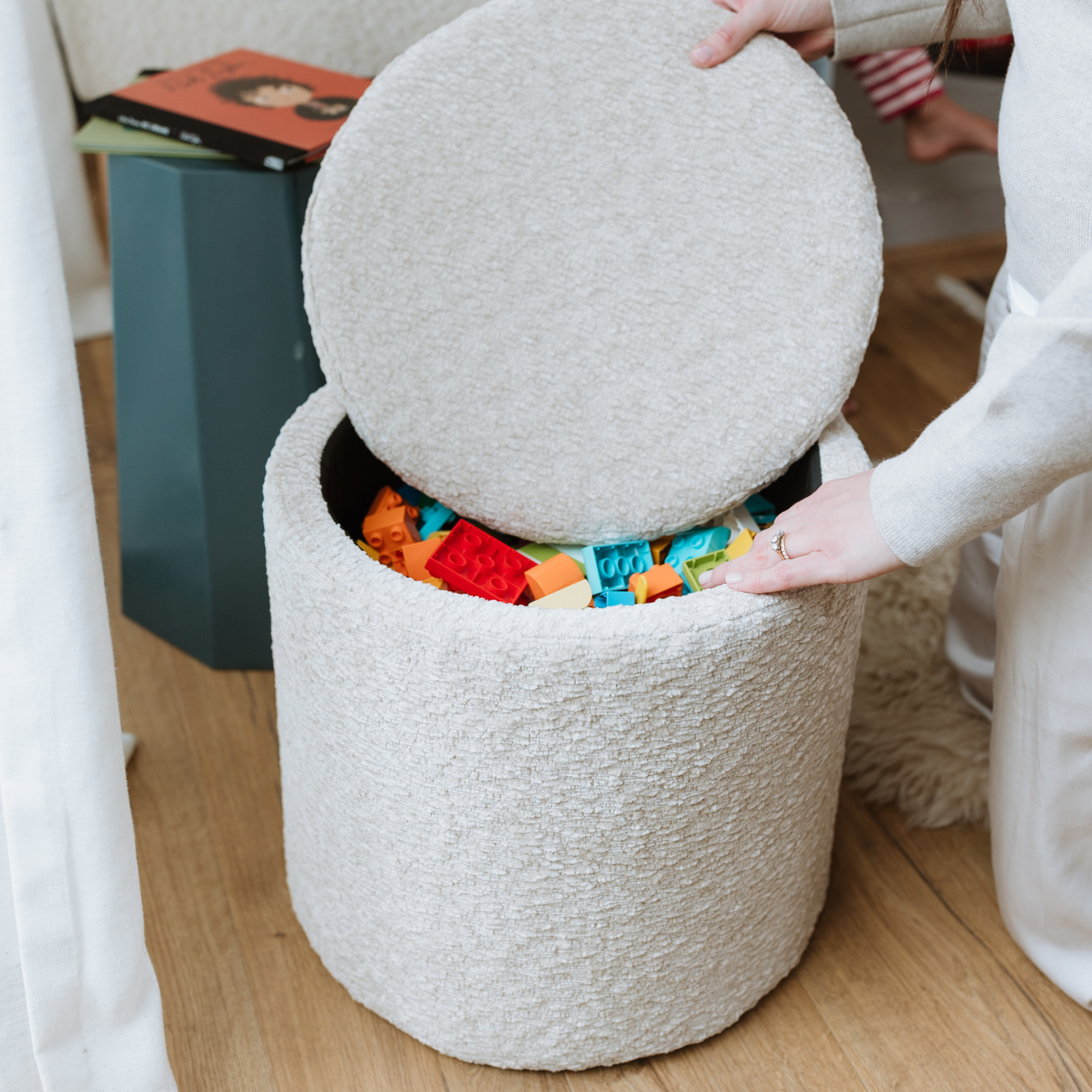Mylo Ottoman with toys in storage